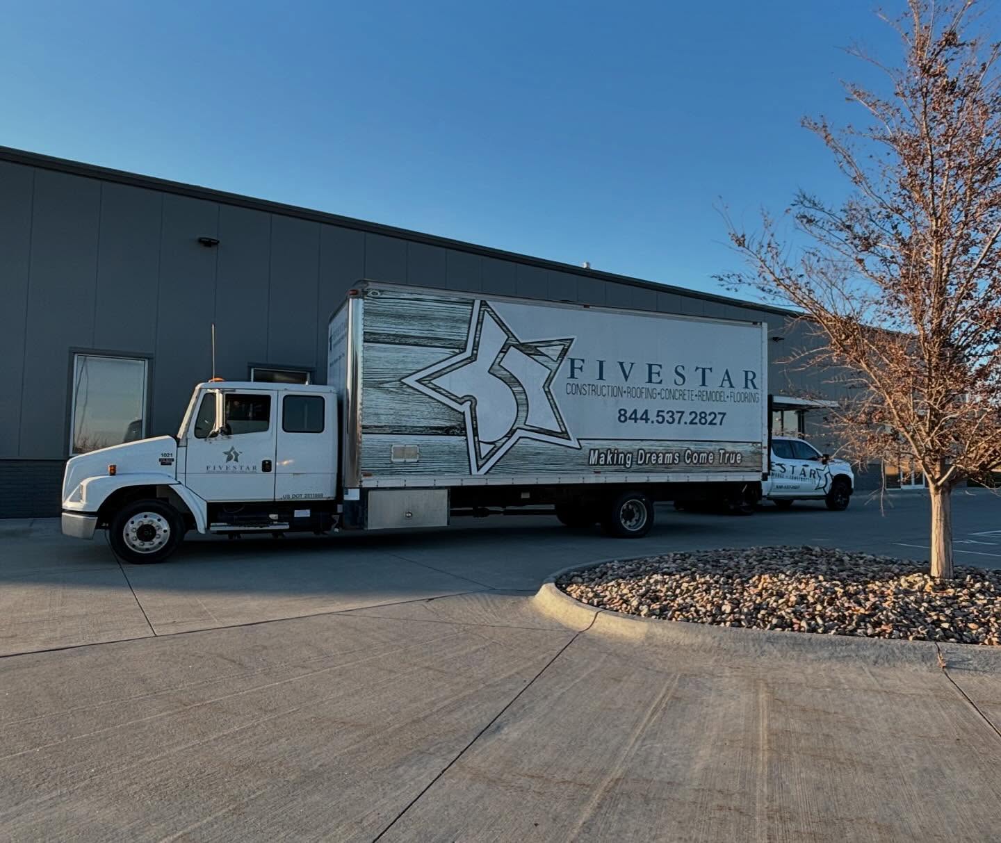 Front of the Fivestar Flooring Omaha office with a white truck that has the company logo