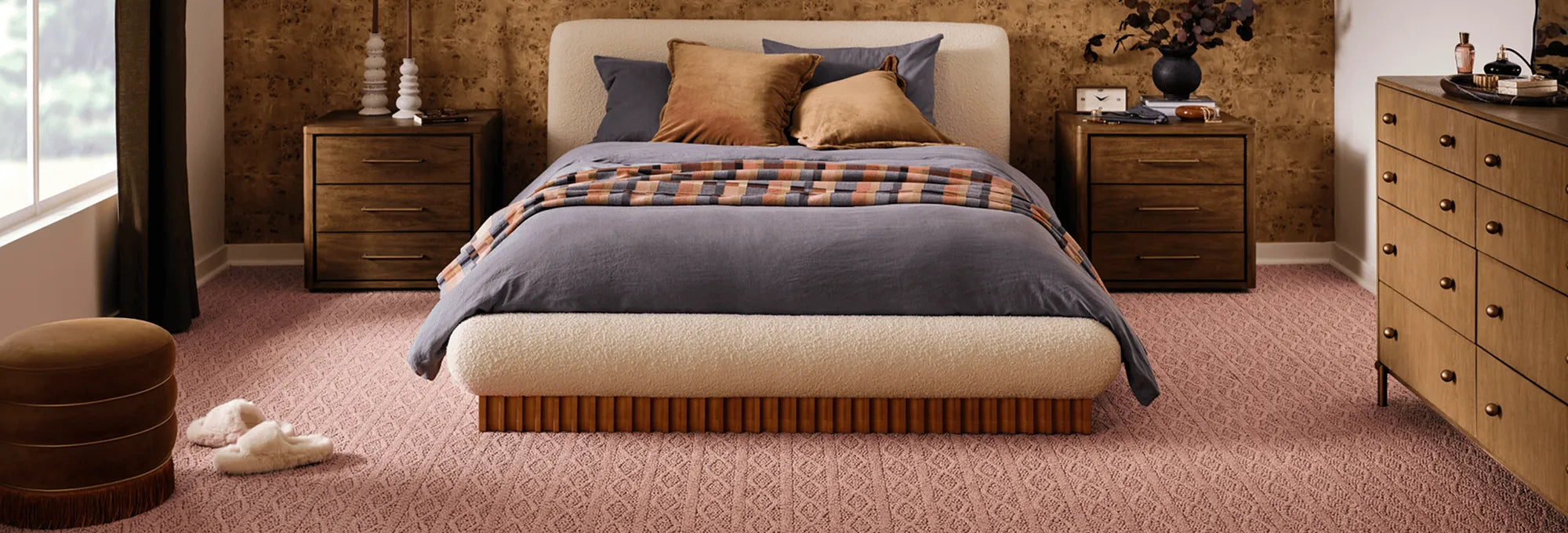 Cozy bedroom with nice flooring and wall design.