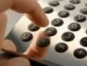 person dialling on calculator from Five Star Flooring in Gothenburg
